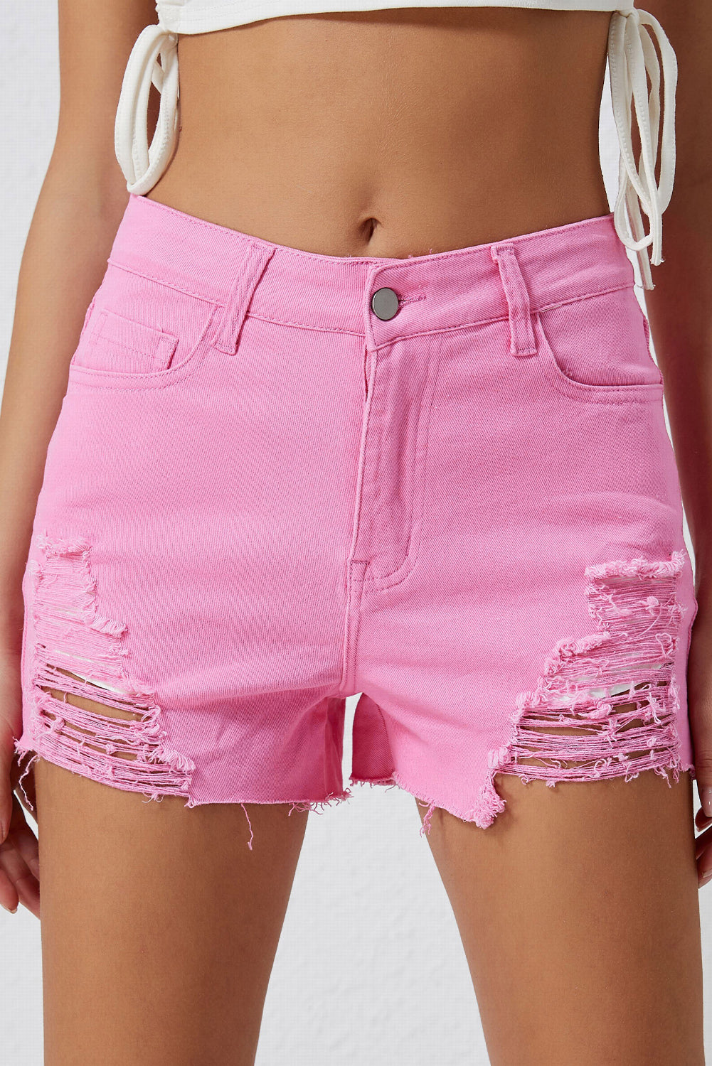 pantalones cortos de mezclilla desgastados
